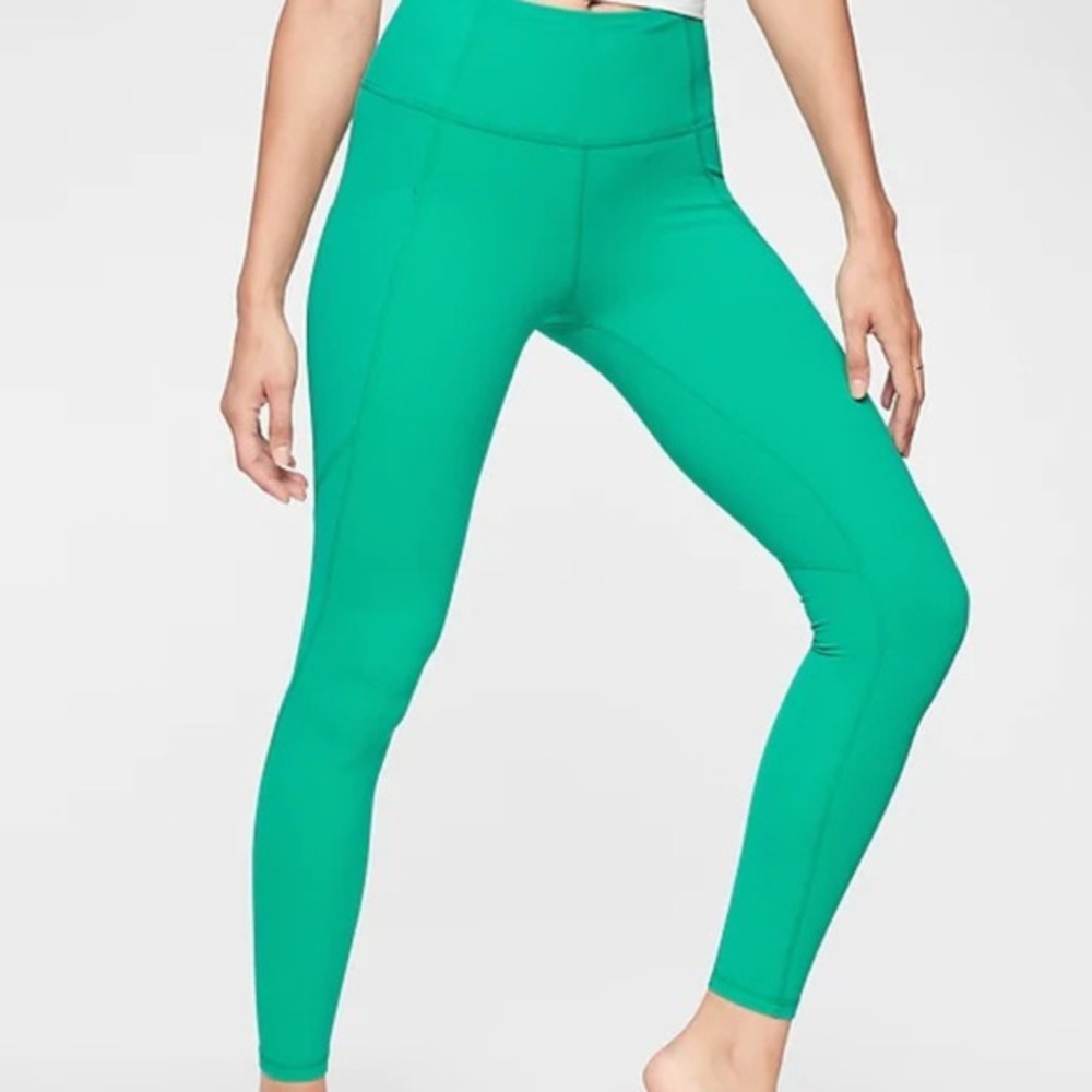 Athleta Green XS Salutation stash pocket 7/8 tight